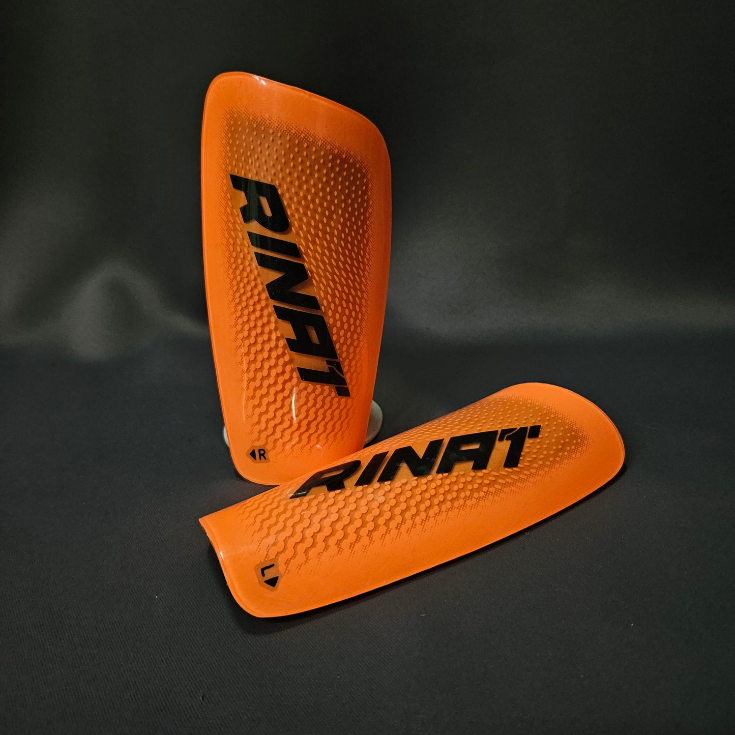 ESPINILLERA Rinat QUANTUM Naranja Negro